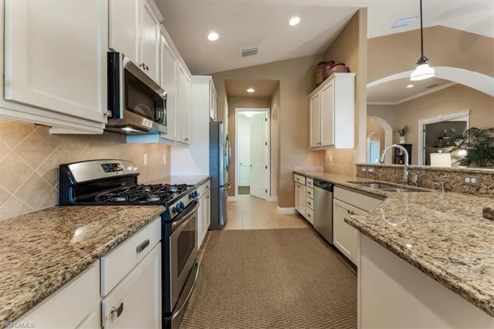 Abundant counter space for food prep & family gatherings.