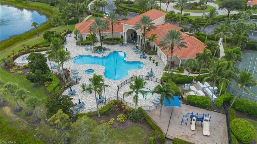 Resort style pool/spa area & clubhouse featuring fitness center, billiard room, pickleball, tennis,&  library.