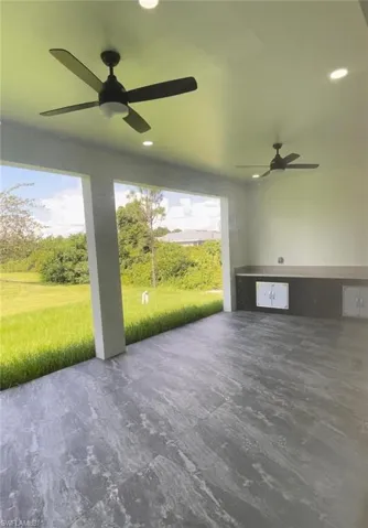 View of patio with ceiling fan