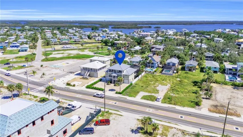 Bird's eye view with a water view VIRTUALLY ENHANCED