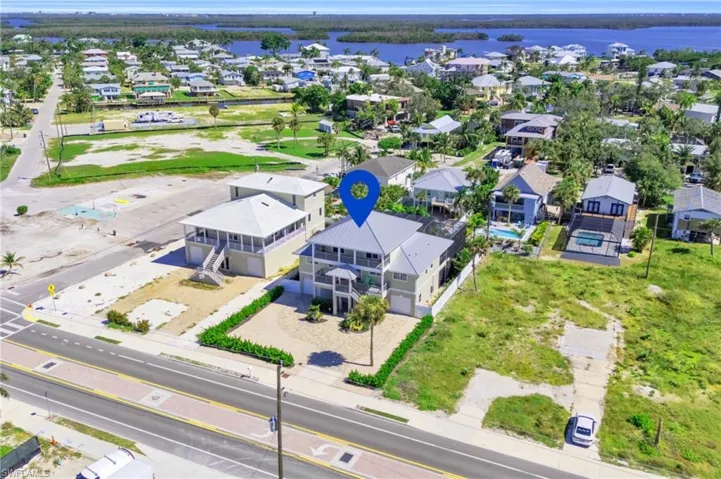 Bird's eye view featuring a water view VIRTUALLY ENHANCED