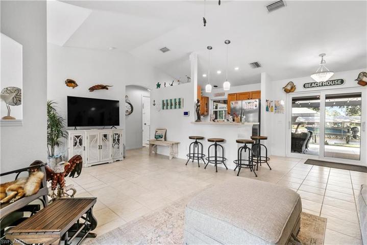 Corner view from living room into kitchen and dinette area