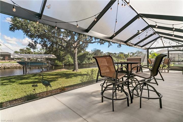 Direct view from extended lanai to canal and boat lift