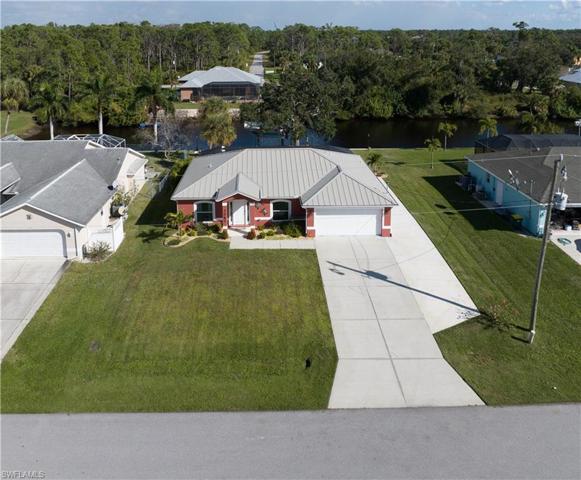 Low aerial view of home and extended driver RV and other