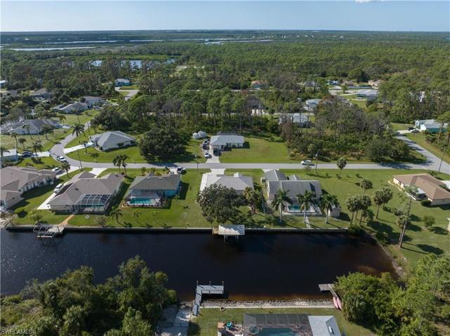 High aerial view of home and canal