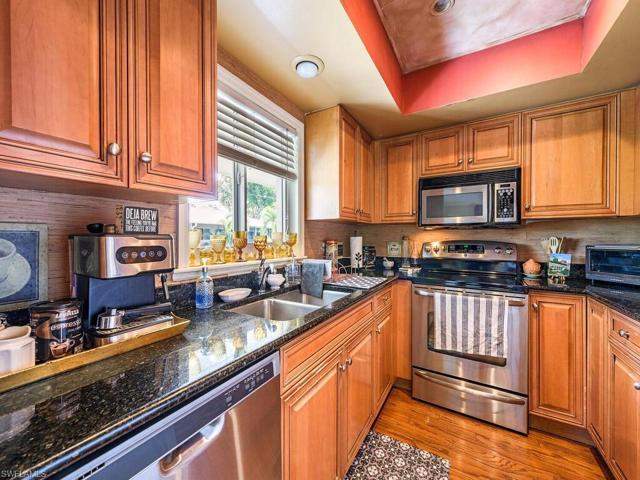 Kitchen with Large Window view to Courtyard