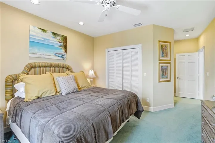Bedroom featuring recessed lighting, a ceiling fan, and light-colored walls