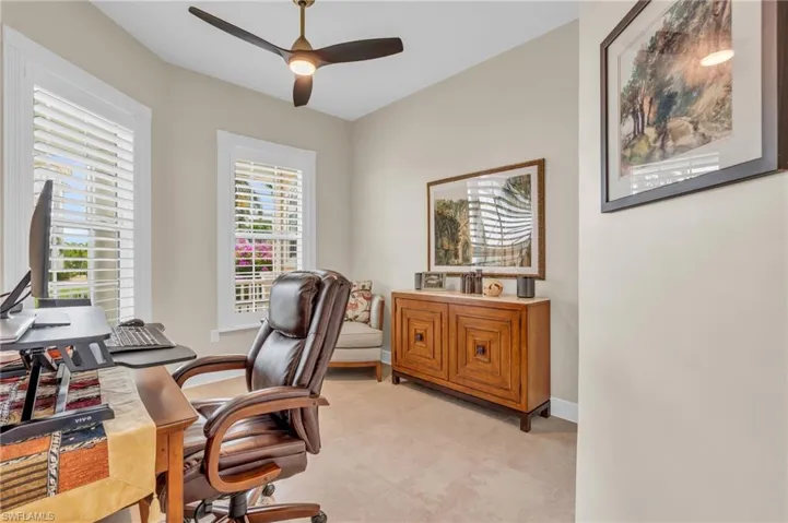 Office area featuring ceiling fan