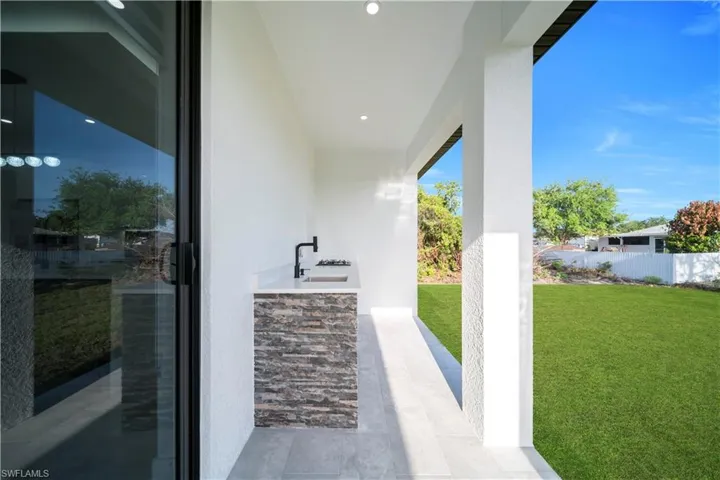 View of patio / terrace with a sink