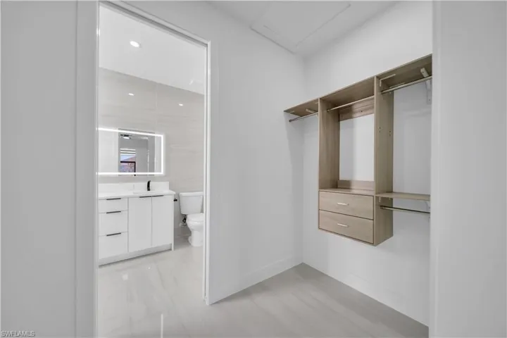 Walk in closet featuring a sink