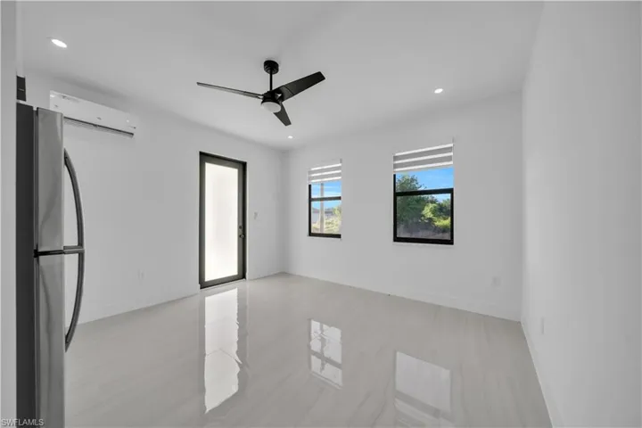 Empty room with recessed lighting, ceiling fan, and light wood finished floors