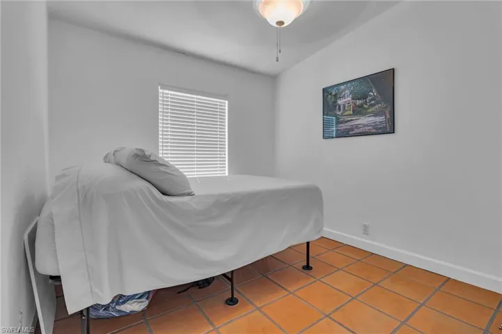 Bedroom with baseboards