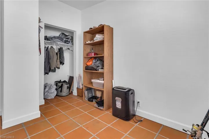 Spacious closet featuring tile patterned floors