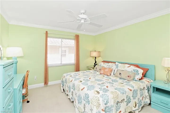 Guest bedroom with crown molding.  Bed can be 2 twins or king as shown.