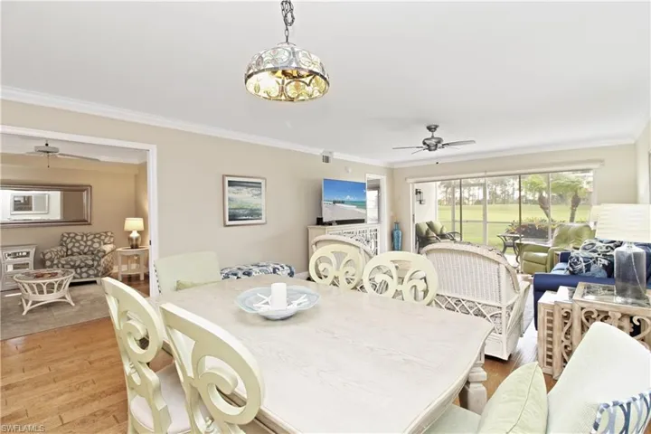 Light and bright living area with golf course view.