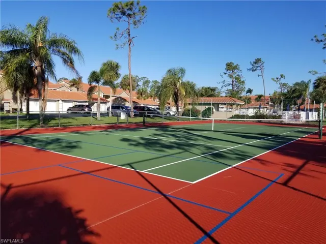 Cobblestone tennis court with pickleball lines