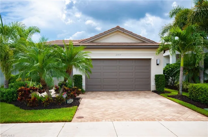Front of house with mature landscaping