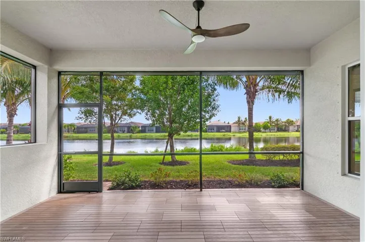 Screened Lanai with ceiling fan and lake view