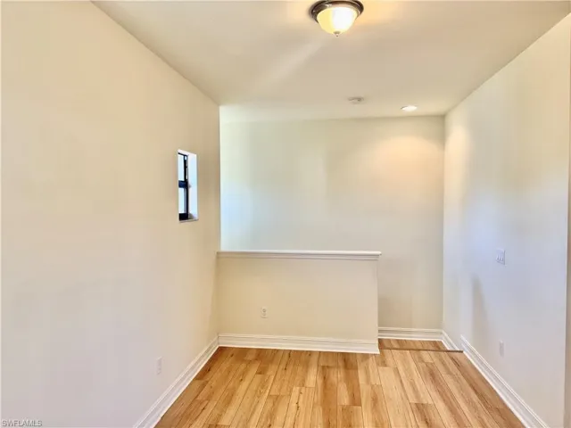 Unfurnished room featuring light wood-type flooring and recessed lighting
