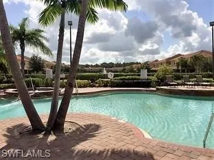 Community pool featuring a patio area