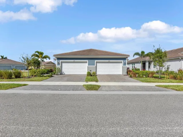 Single story home featuring a garage