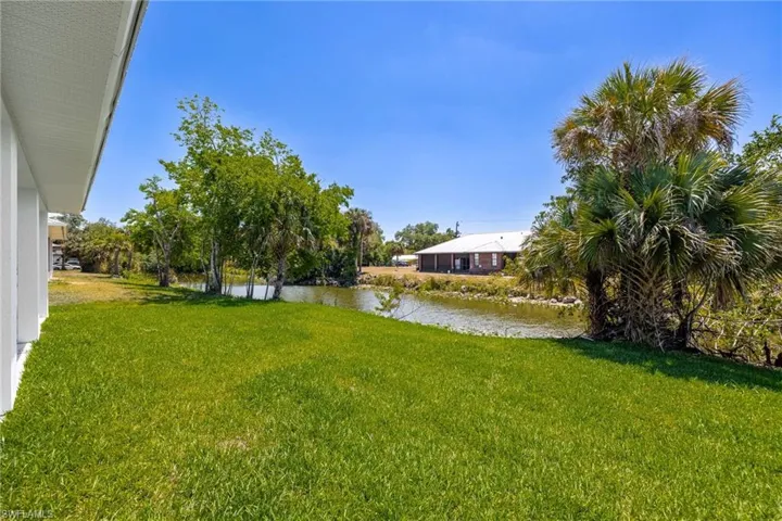 View of yard featuring a water view