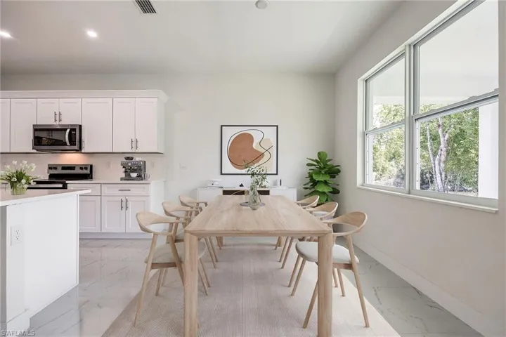 Dining space featuring visible vents, recessed lighting, marble finish floor, and baseboards