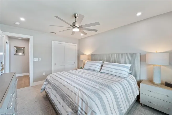 Bedroom featuring recessed lighting, a closet, and ceiling fan