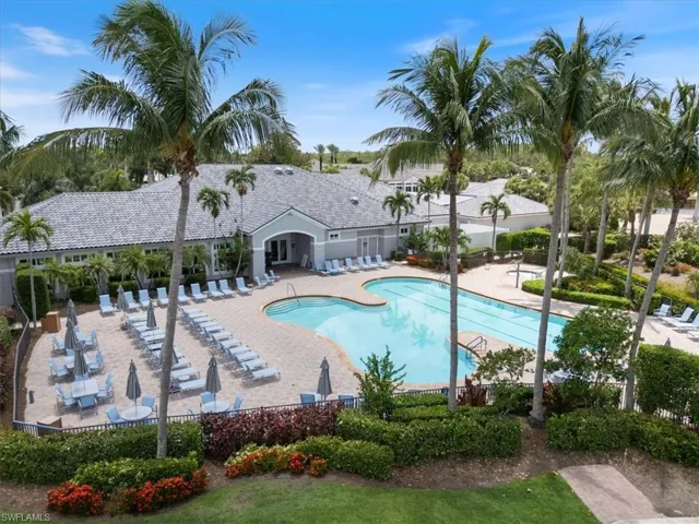 Community pool featuring a patio