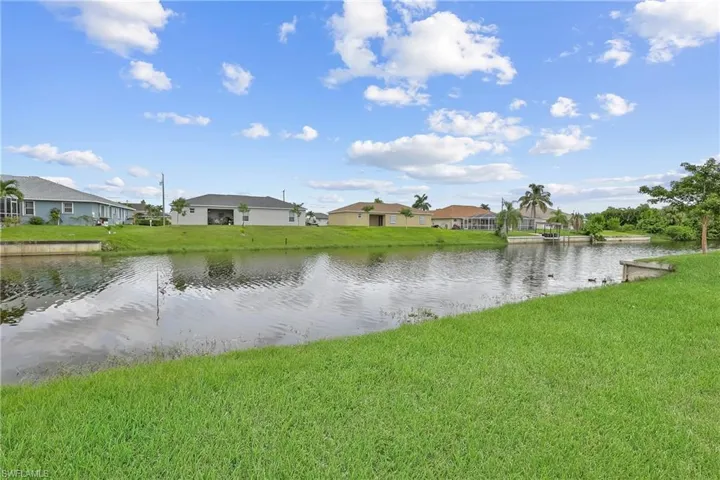 Water view featuring nearby suburban area