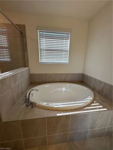Bathroom featuring a bath