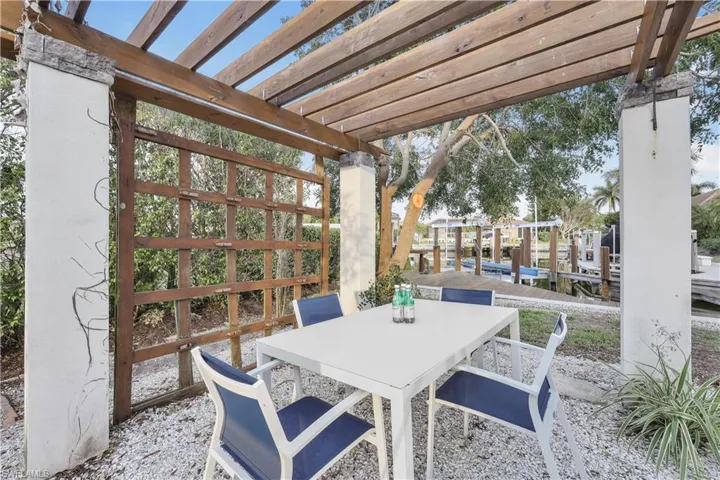 View of patio / terrace with a pergola and outdoor dining space