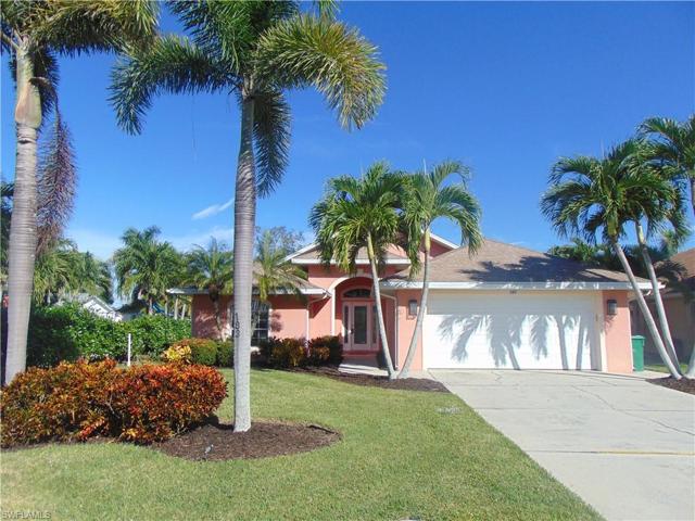 Beautiful palm trees adorn the front yard