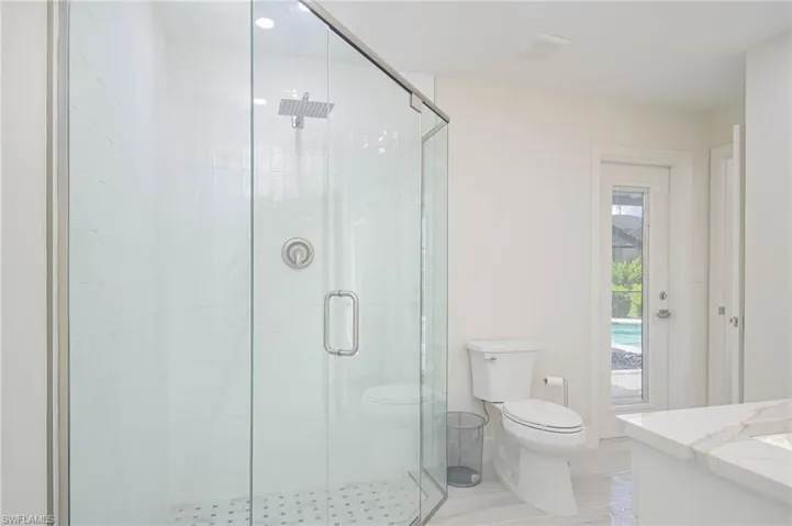Frameless Shower Doors in BOTH bathrooms!