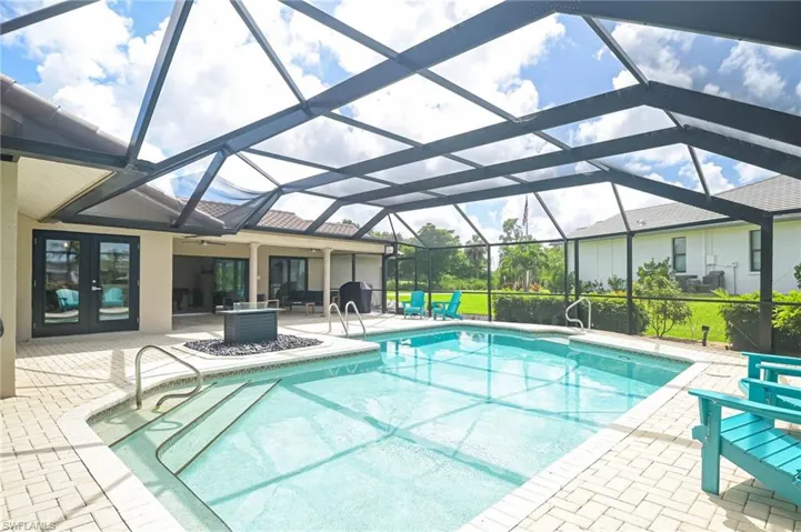 Pool area with (5) accesses to the interior of this home!