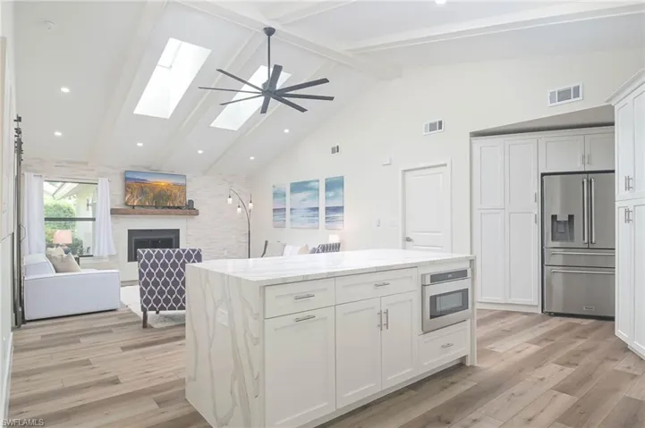 LUXURY VINYL flooring!  Vaulted Ceilings!  Skylights!