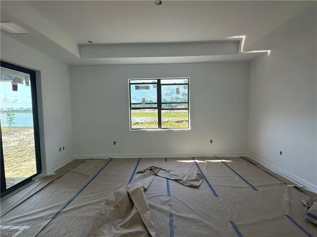 Spare room featuring a healthy amount of sunlight
