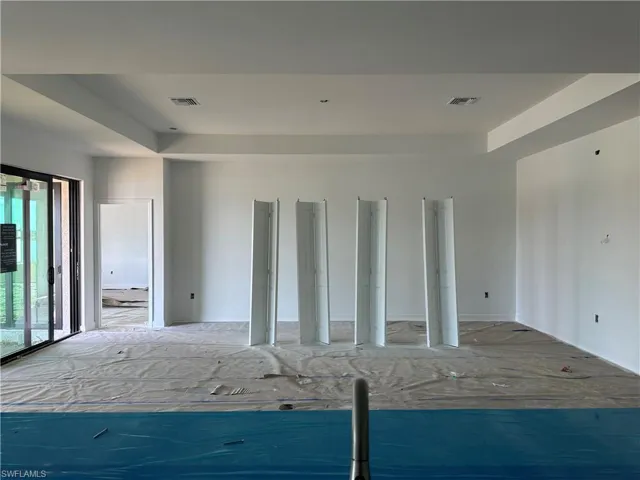 Spare room featuring a raised ceiling