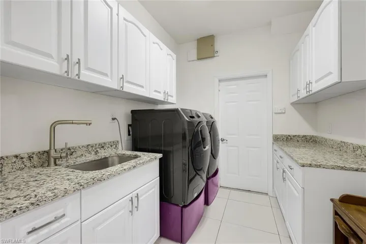 White cabinetry with brushed nickel hardware