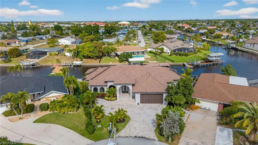 Aerial view of residential area with a large body of water