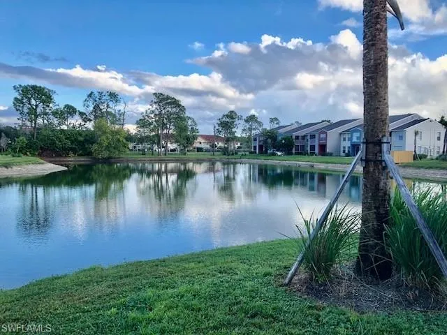 Water view featuring nearby suburban area