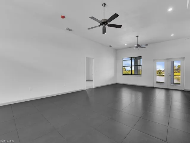 Unfurnished room featuring recessed lighting, visible vents, baseboards, and ceiling fan
