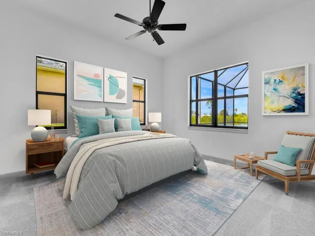Bedroom featuring carpet flooring, a ceiling fan, and baseboards