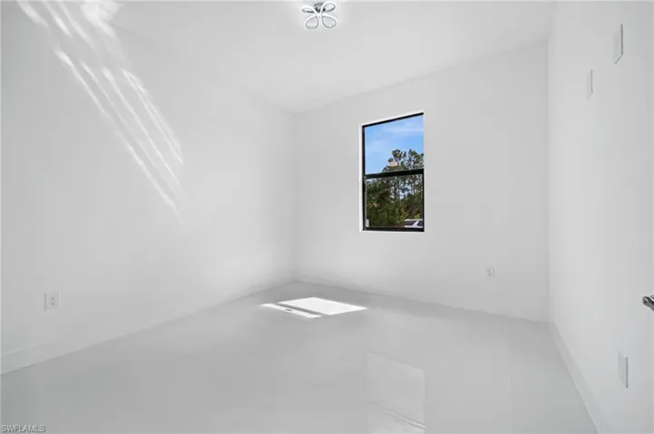 Spare room with baseboards