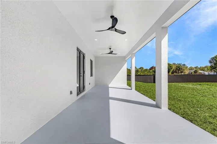 View of patio featuring a ceiling fan