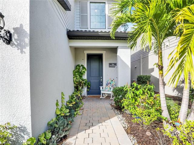 Tropical landscaping leads to front door
