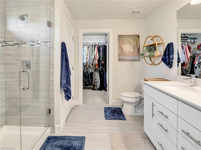 Primary bathroom with walk-in closet