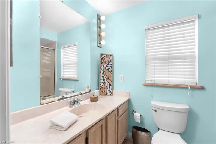 Bathroom with toilet and vanity