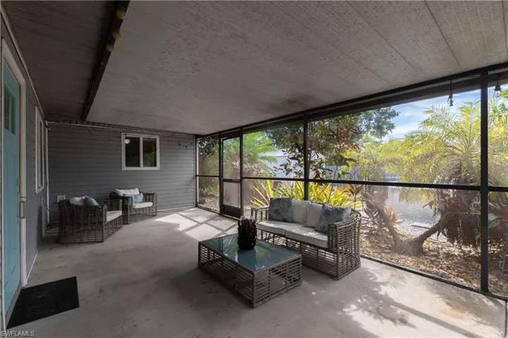Sunroom / solarium with outdoor lounge area