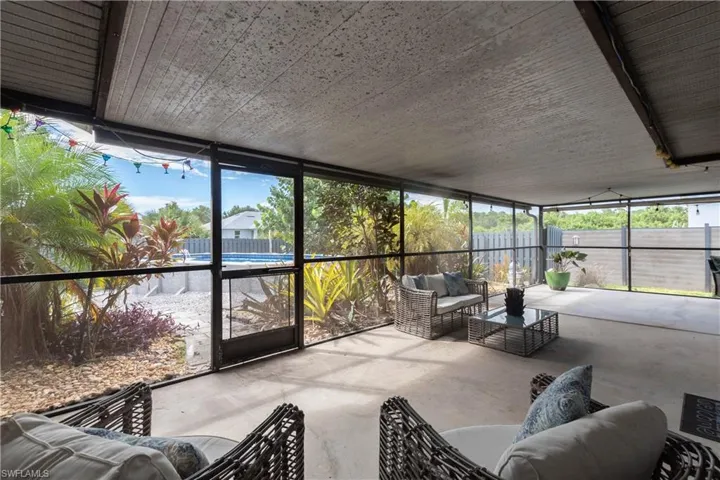Sunroom with an outdoor living space